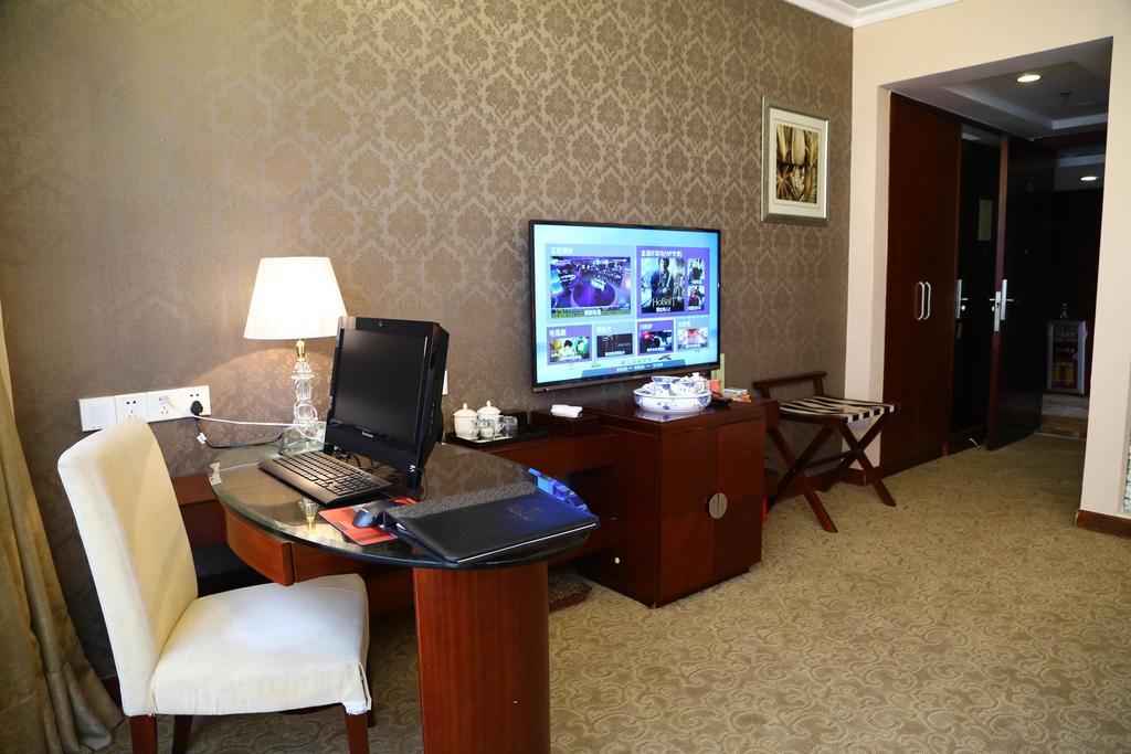 Long Zhou Grand Hotel Γκουανγκζού Δωμάτιο φωτογραφία