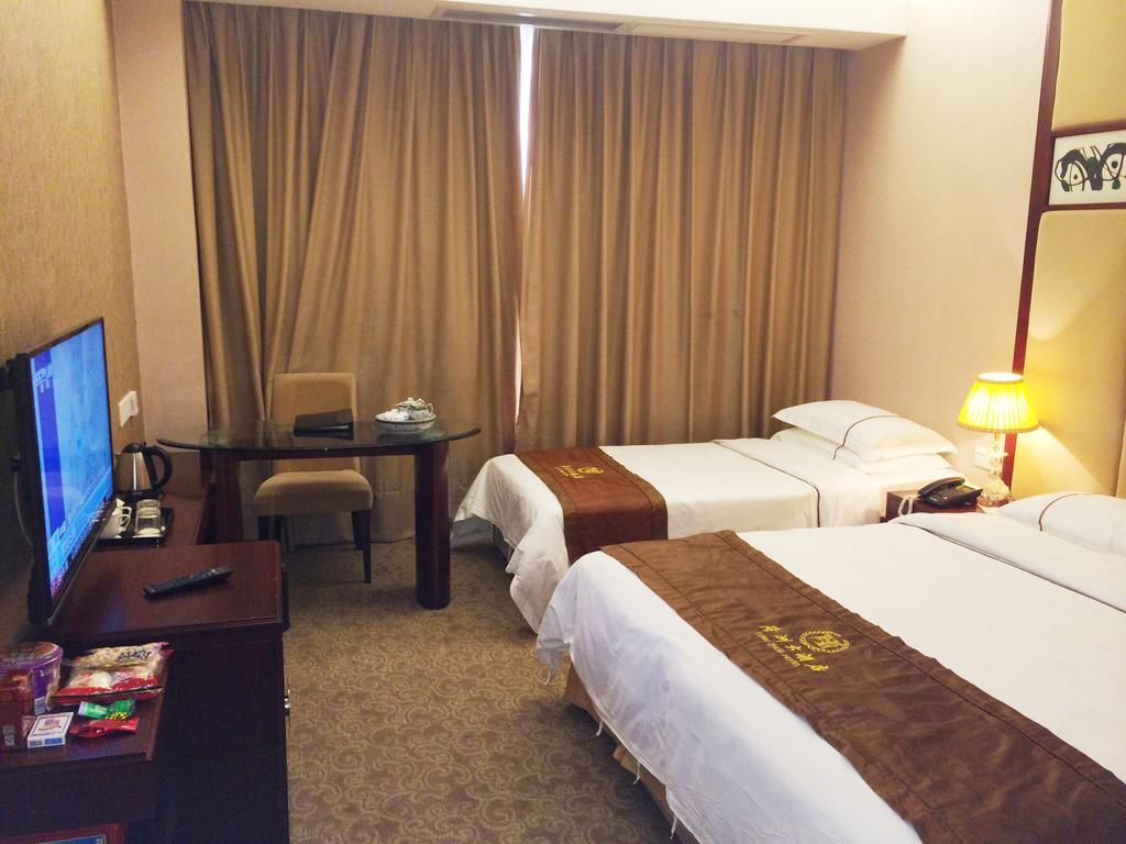 Long Zhou Grand Hotel Γκουανγκζού Δωμάτιο φωτογραφία