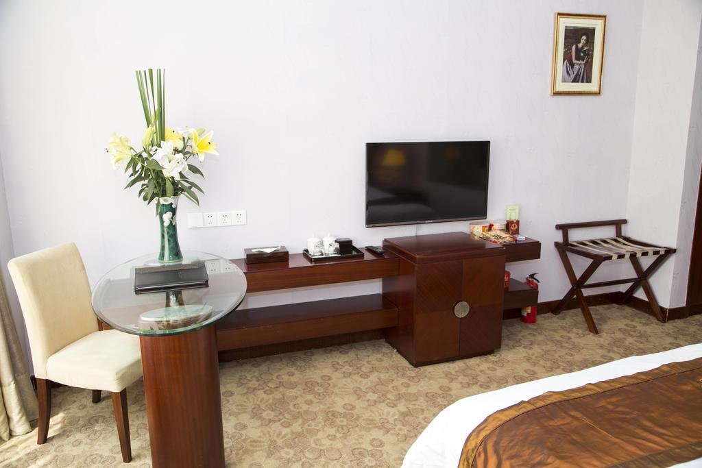 Long Zhou Grand Hotel Γκουανγκζού Δωμάτιο φωτογραφία
