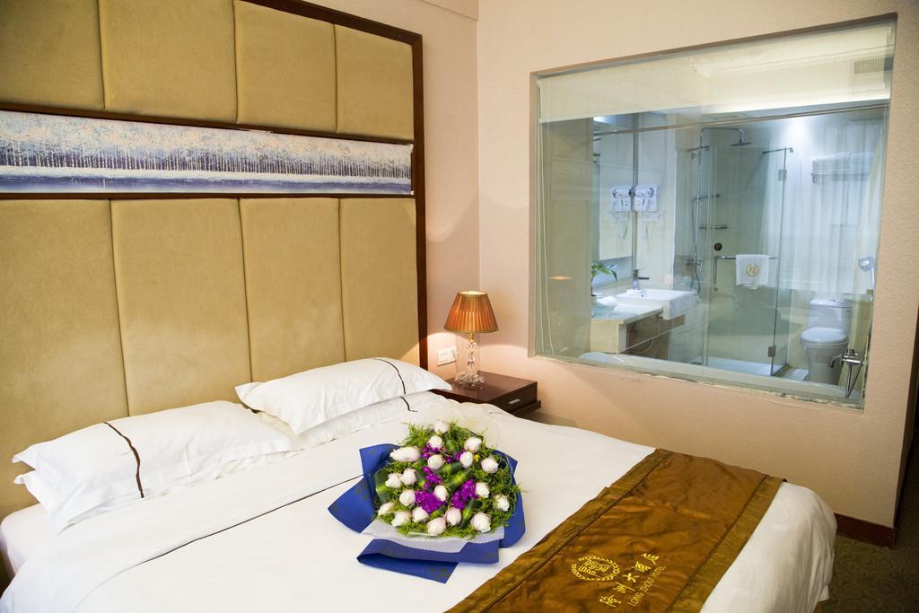 Long Zhou Grand Hotel Γκουανγκζού Δωμάτιο φωτογραφία