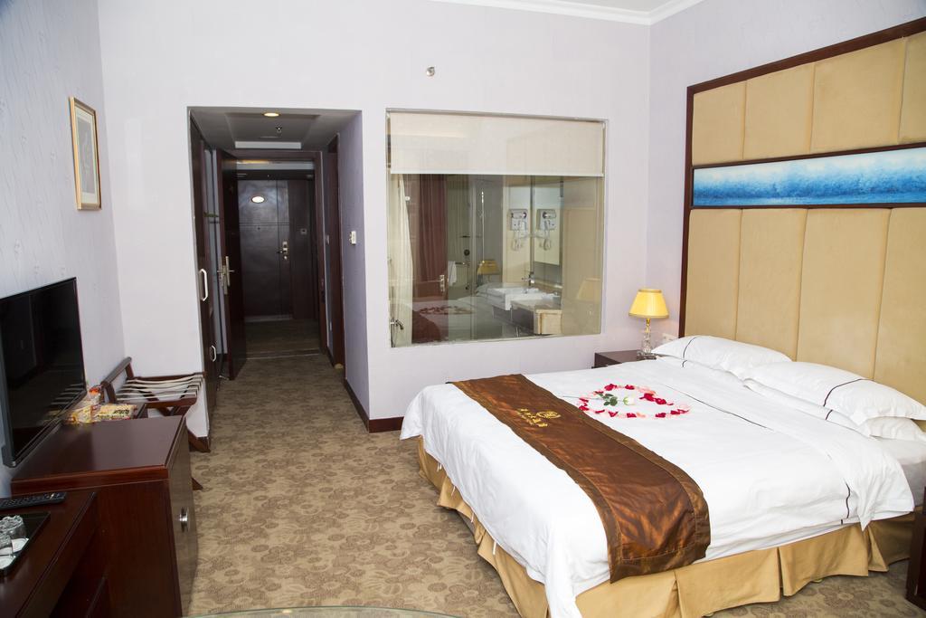 Long Zhou Grand Hotel Γκουανγκζού Δωμάτιο φωτογραφία