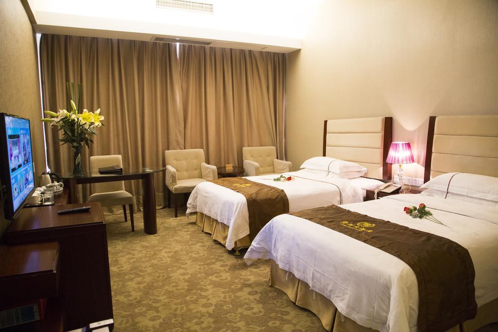 Long Zhou Grand Hotel Γκουανγκζού Δωμάτιο φωτογραφία
