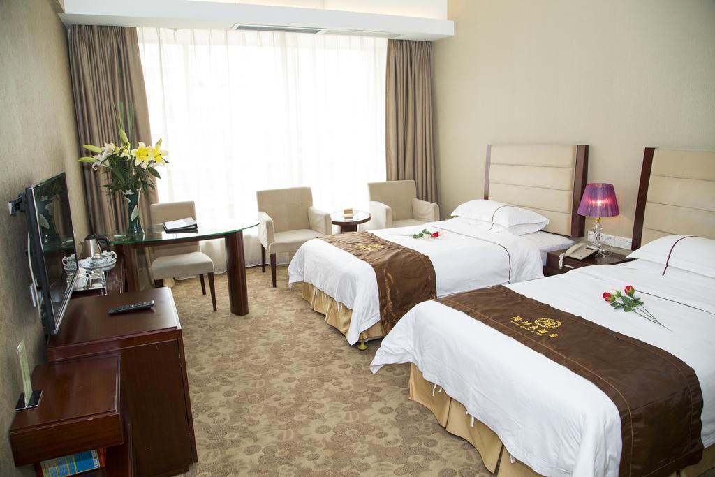 Long Zhou Grand Hotel Γκουανγκζού Δωμάτιο φωτογραφία