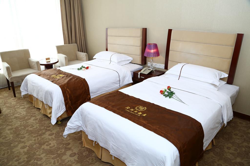 Long Zhou Grand Hotel Γκουανγκζού Δωμάτιο φωτογραφία